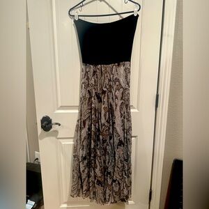 It can be a strapless dress or a long skirt of your chose